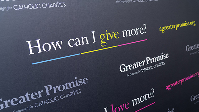 Photo of the backdrop for the event for Catholic Charities
